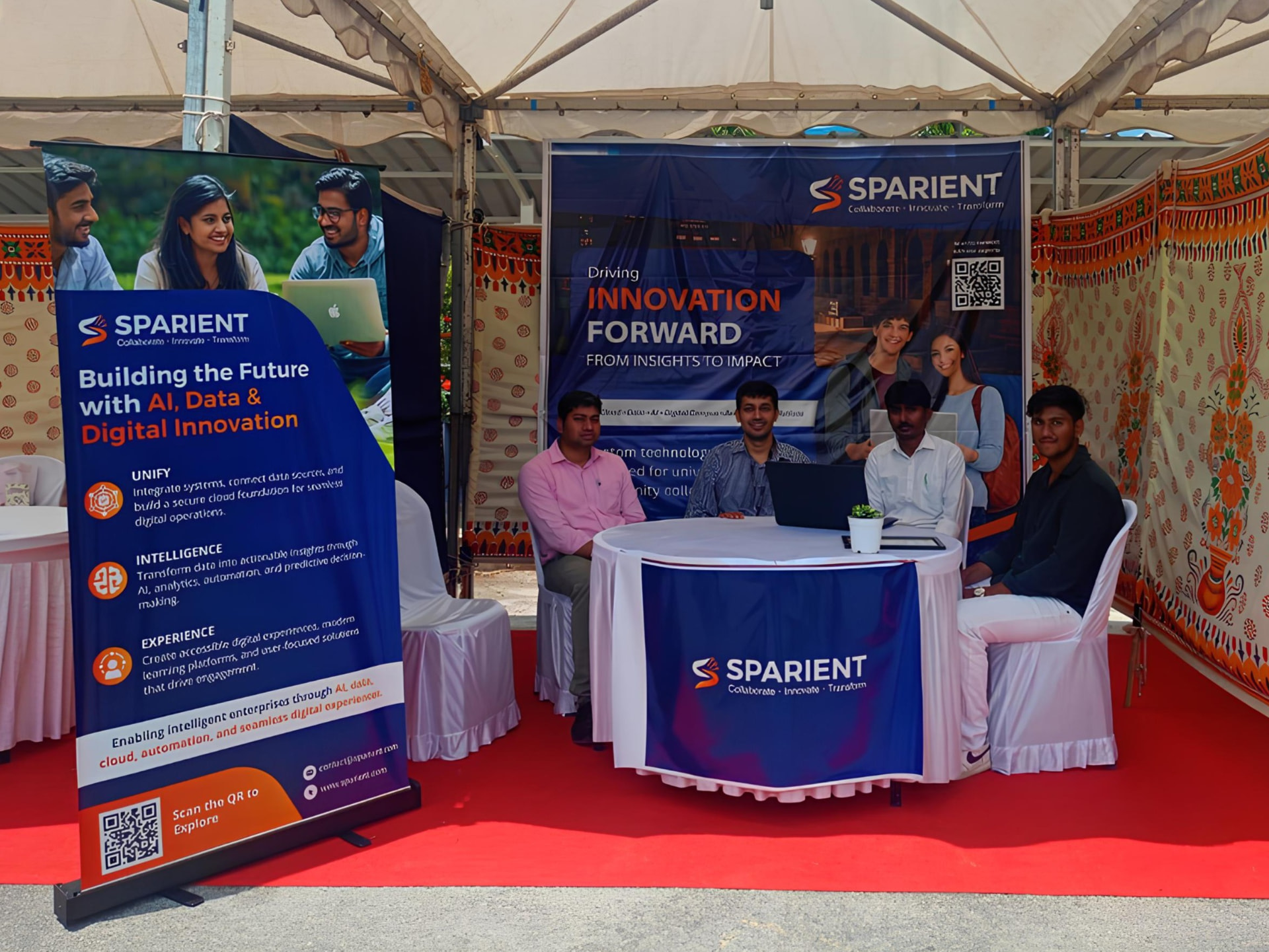 Sparient booth with team members at Innovotsava 2026 in Mysore, India