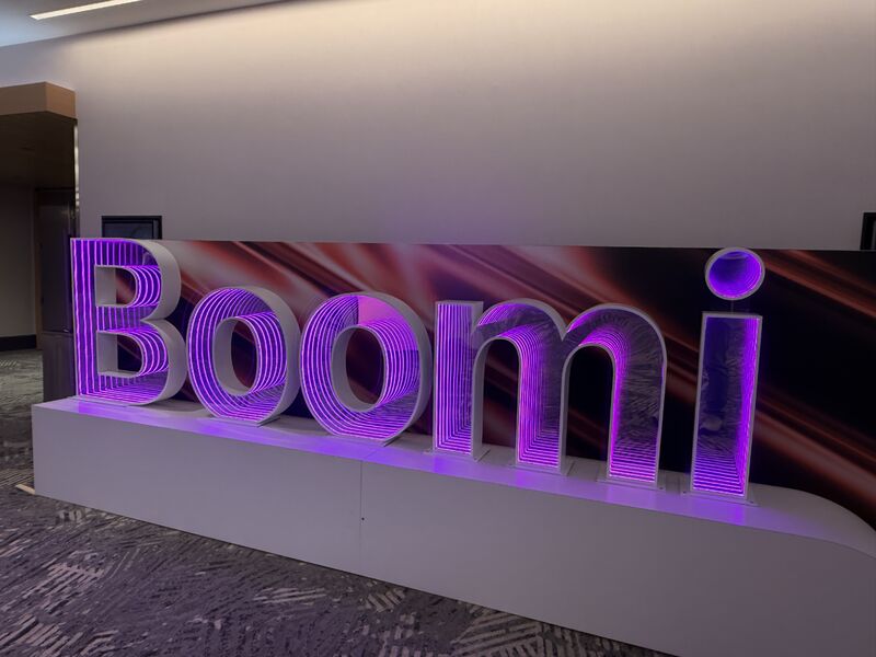 Illuminated Boomi signage at Boomi World 2026 in Chicago